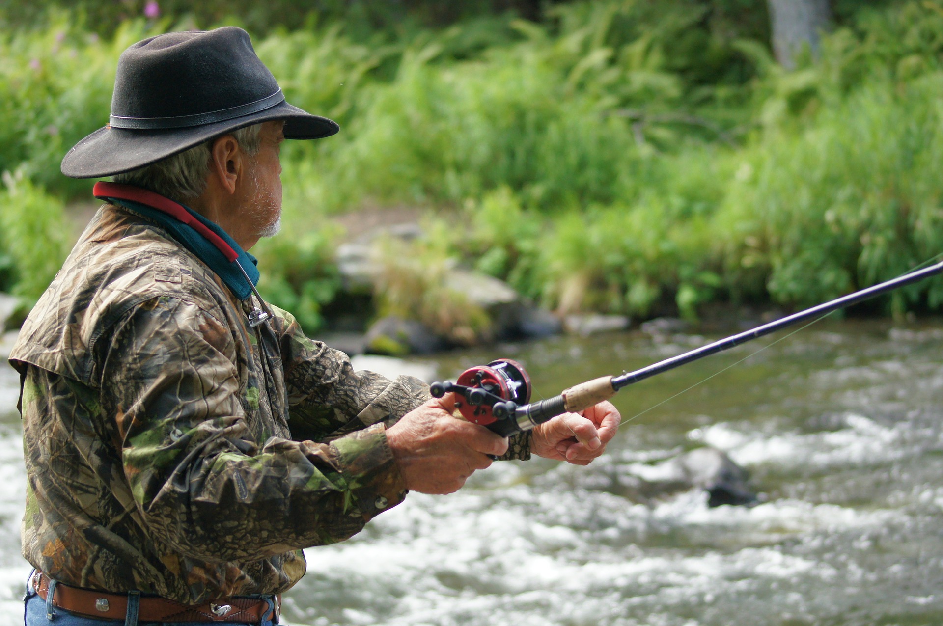 A man fishing like guests of Buffalo Cabins and Lodges can do in summer and fall.